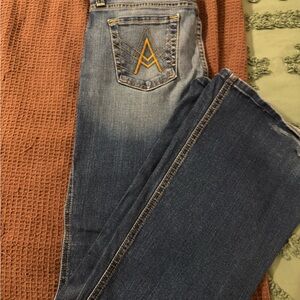 Stylish Blue Jeans with Gold Stitching